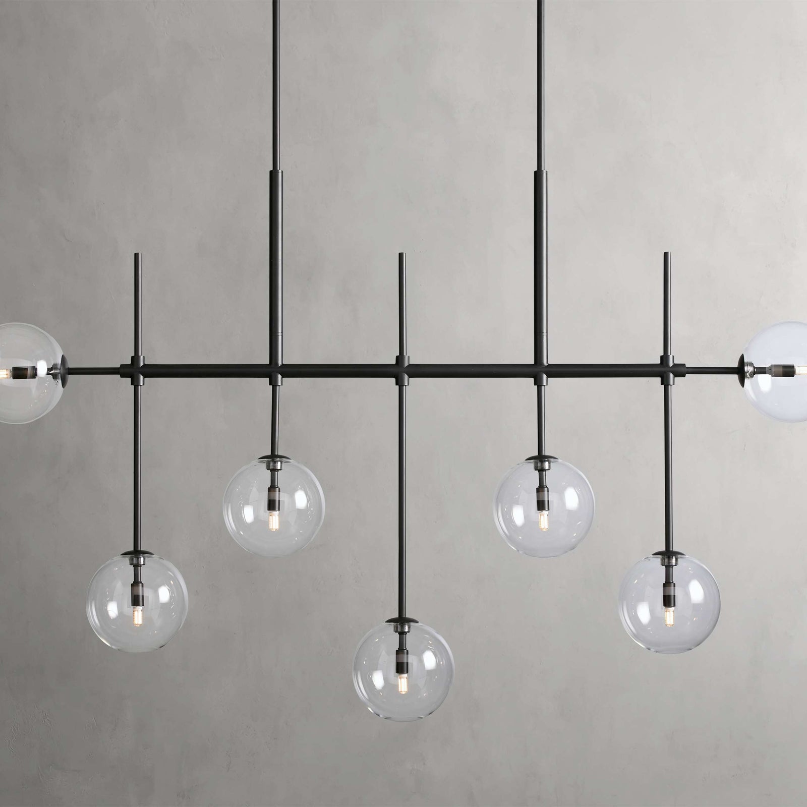 Clear Glass Linear chandelier - Aurelia Arc for dining room view 1